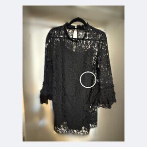 Black lace dress with slip.